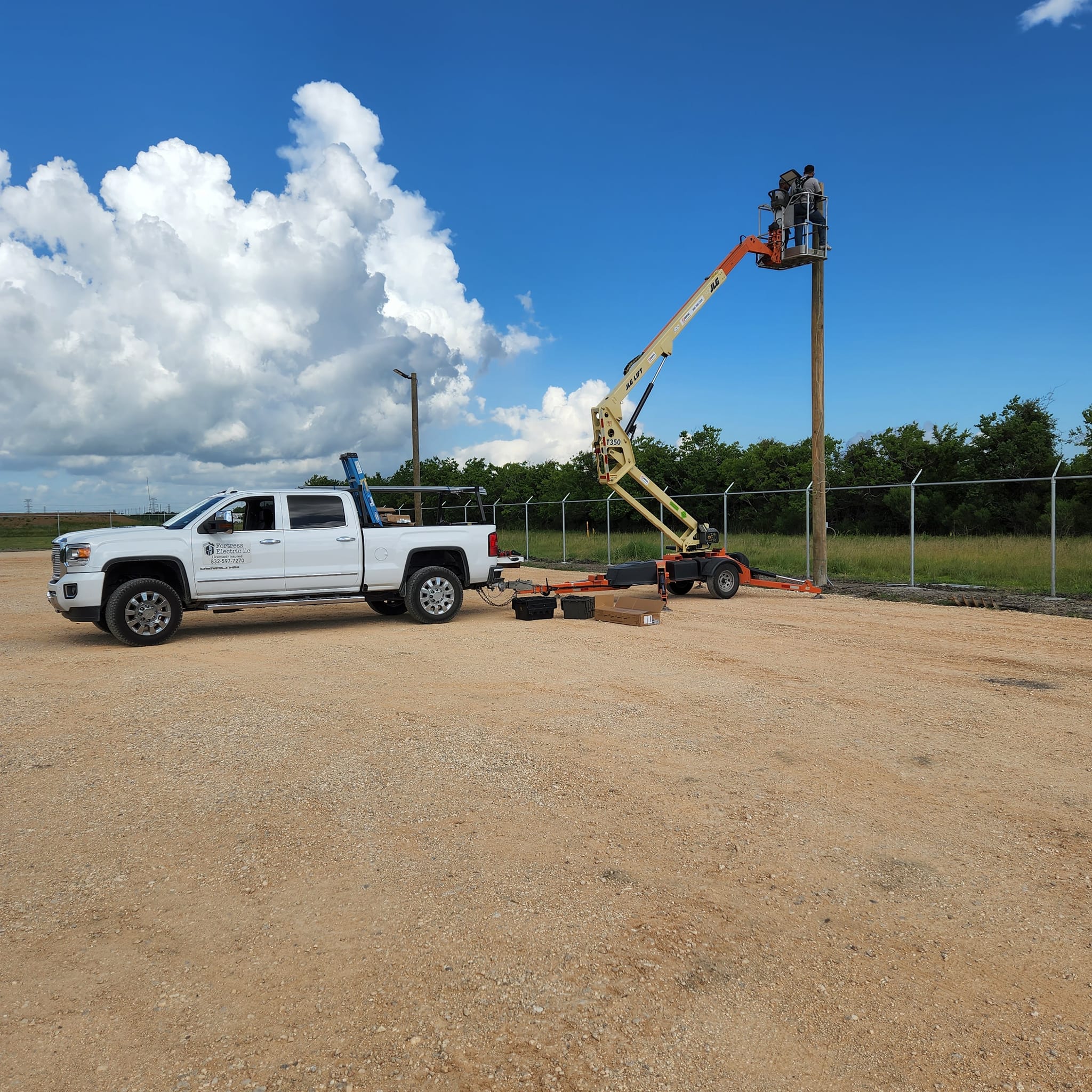Fortress Electric crew and truck working at an electrical site